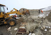تخریب ساخت و ساز غیرمجاز در اراضی کمربند سبز مشهد در منطقه خسروآباد
