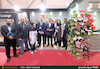 عکس دسته جمعی حامد مظاهرین با برگزار کنندگان نمایشگاه پروژه ایران