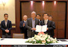 محمود نویدی و مقام کره ای پس از امضای تفاهم نامه