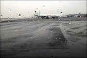 فرودگاه باران هواپیما