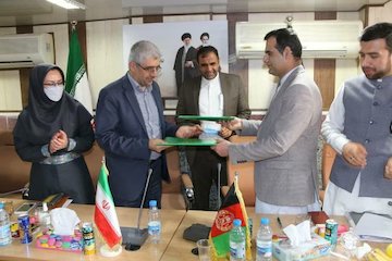 احداث پل دوم میلک تیرماه ۱۴۰۰ عملیاتی میشود/ اهمیت این مرز بازرگانی در تامین منافع تجاری ایران و افغانستان امضا تفاهنامه میلک (2).jpg