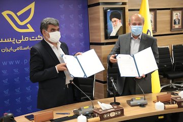 تفاهمنامه همکاری بنیاد مسکن و شرکت ملی پست امضا شد تفاهم نامه