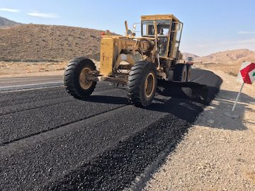 اجراى عمليات روكش آسفالت ١٠ كيلومتر از محور درزوسايبان روکش آسفالت درزو سایبان