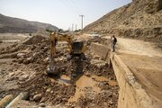 تلاش نیروهای راهداری خوزستان برای بازگشایی مسیرها
