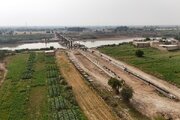 بینید | تداوم عملیات اجرایی احداث پل عنافچه بر روی رودخانه کارون در خوزستان