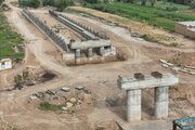 بینید | تداوم عملیات اجرایی احداث پل عنافچه بر روی رودخانه کارون در خوزستان