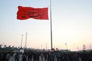 آیین برافراشتن پرچم سیدالشهدا(ع) با شعار «ایران حرم است» در مرز شلمچه برگزار شد