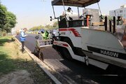 ببینید/گزارش تصویری از عملیات روکش آسفالت آزادراه کرج قزوین محدوده مهرویلا