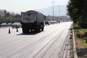 ببینید/گزارش تصویری از عملیات روکش آسفالت آزادراه کرج قزوین محدوده مهرویلا