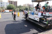 ببینید/گزارش تصویری از عملیات روکش آسفالت آزادراه کرج قزوین محدوده مهرویلا
