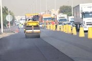 ببینید/گزارش تصویری از عملیات روکش آسفالت آزادراه کرج قزوین محدوده مهرویلا