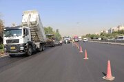 ببینید/گزارش تصویری از عملیات روکش آسفالت آزادراه کرج قزوین محدوده مهرویلا