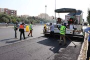 ببینید/گزارش تصویری از عملیات روکش آسفالت آزادراه کرج قزوین محدوده مهرویلا