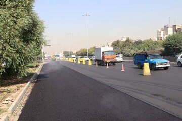 ببینید/گزارش تصویری از عملیات روکش آسفالت آزادراه کرج قزوین محدوده مهرویلا