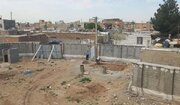 احداث پروژه مدرسه ۶ کلاسه شریف آباد در مرحله اجرای دیوار چینی ساختمان