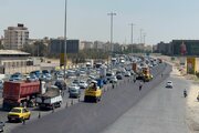 ببینید | ادامه عملیات روکش آسفالت آزادراه کرج قزوین محدوده پل حصارک