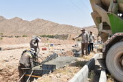استمرار عملیات اجرایی تقاطع غیرهمسطح بیمارستان خرداد مهدیشهر استان سمنان در روزهای گرم تابستان