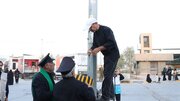 برافراشته شدن پرچم حرم امام رضا در پایانه مرزی شلمچه