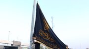 برافراشته شدن پرچم حرم امام رضا در پایانه مرزی شلمچه