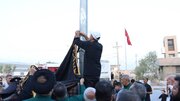 برافراشته شدن پرچم حرم امام رضا در پایانه مرزی شلمچه