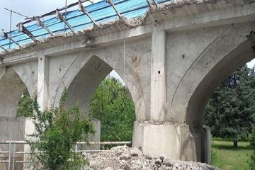 یی