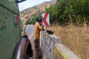 ببینید| عملیات ایمن سازی قوس حادثه خیز در کمربندی شاهو با نصب تابلو و علائم محور روانسر- پاوه استان کرمانشاه